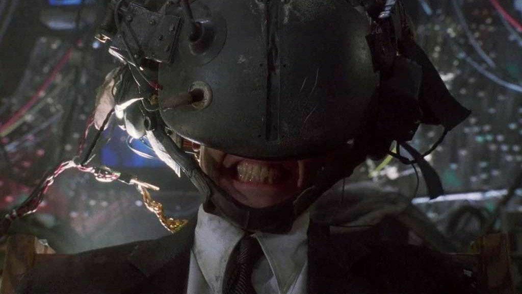 Johnny Mnemonic grimacing in a headset